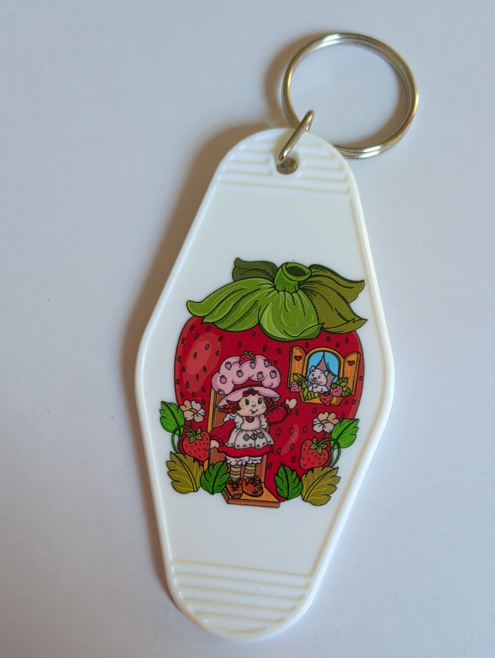 White Strawberry House Keychain with Red & Green Artwork